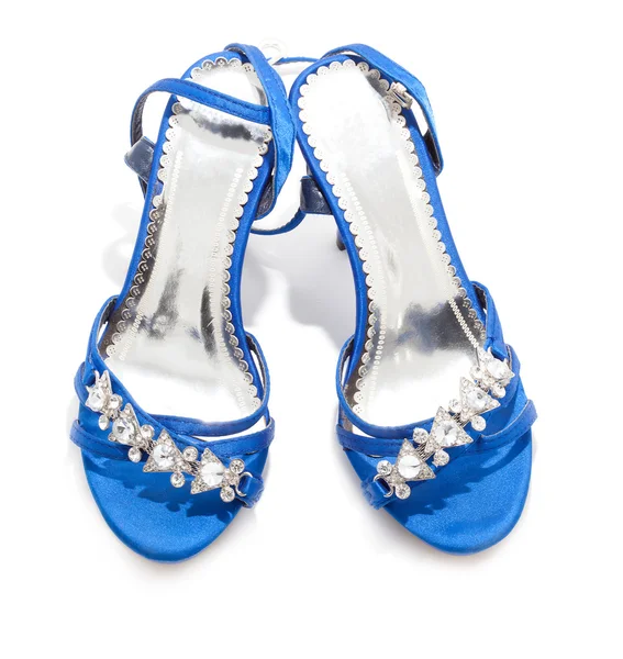 Женская обувь на белом фоне — стоковое фото