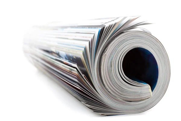 Rolled magazine isolated on white — Stock Photo, Image