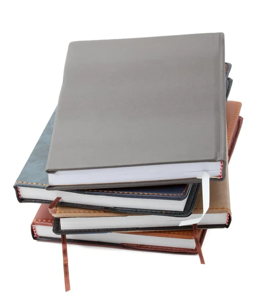 Σωρός από datebooks που απομονώνονται σε λευκό — Φωτογραφία Αρχείου