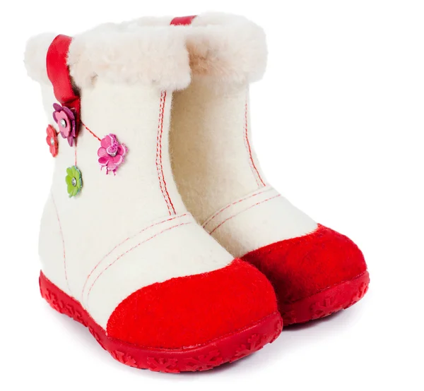 Calzado de fieltro niño blanco con suela de goma roja aislada — Foto de Stock