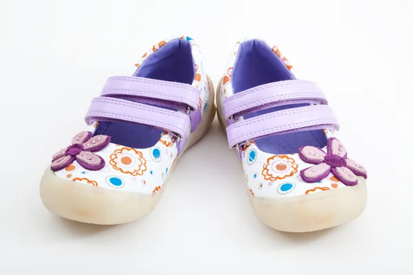 Pair of baby shoes over a white background — Stock Photo, Image