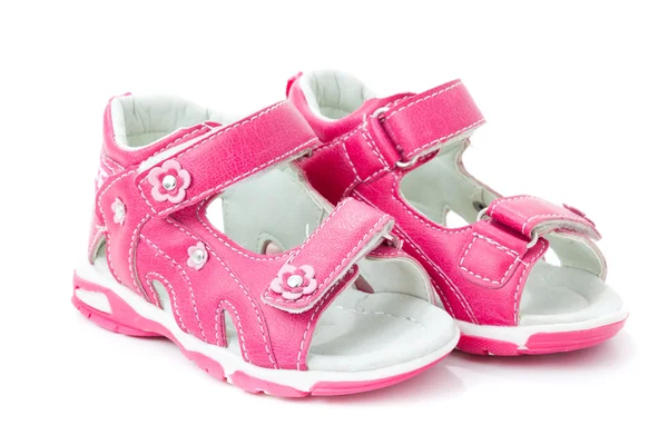 Par de sapatos de bebê sobre um fundo branco — Fotografia de Stock
