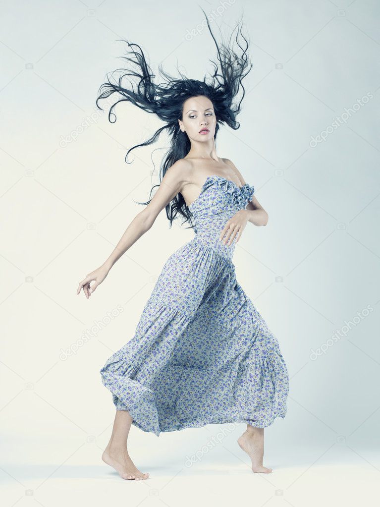 Portrait of beautiful dancing woman