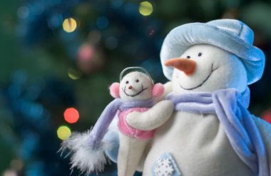 Snowman with his little baby clipart