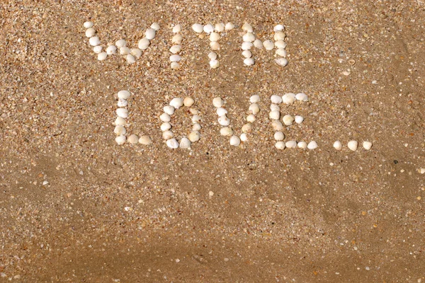 Älska inskriptioner på stranden — Stockfoto