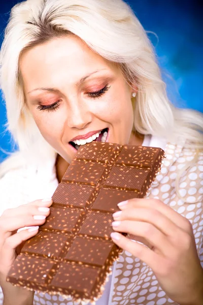Woman with bar of chocolate — Stock Photo, Image