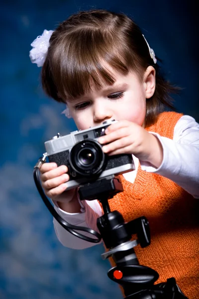 カメラを持つ少女 ストック画像