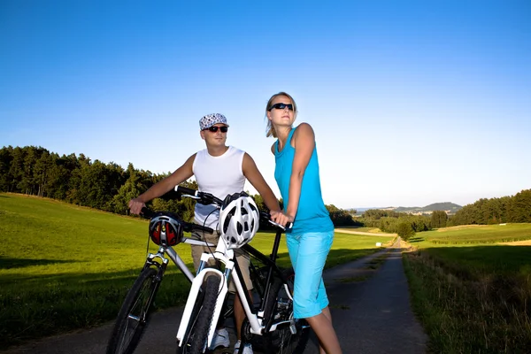Biking couple Stock Image