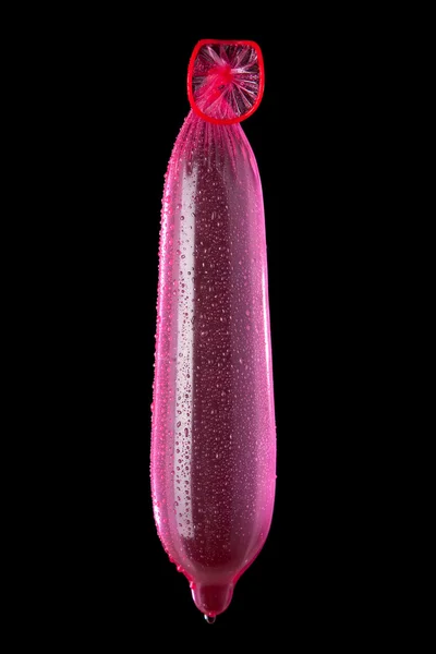 Червоний презерватив — стокове фото