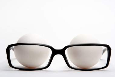 Reading glasses and eggs clipart