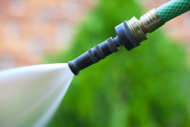 Water from a garden hose clipart