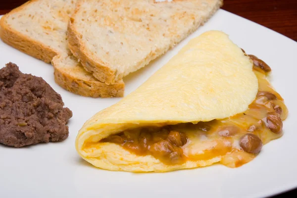 Omelet with beans and cheese — Stock Photo, Image
