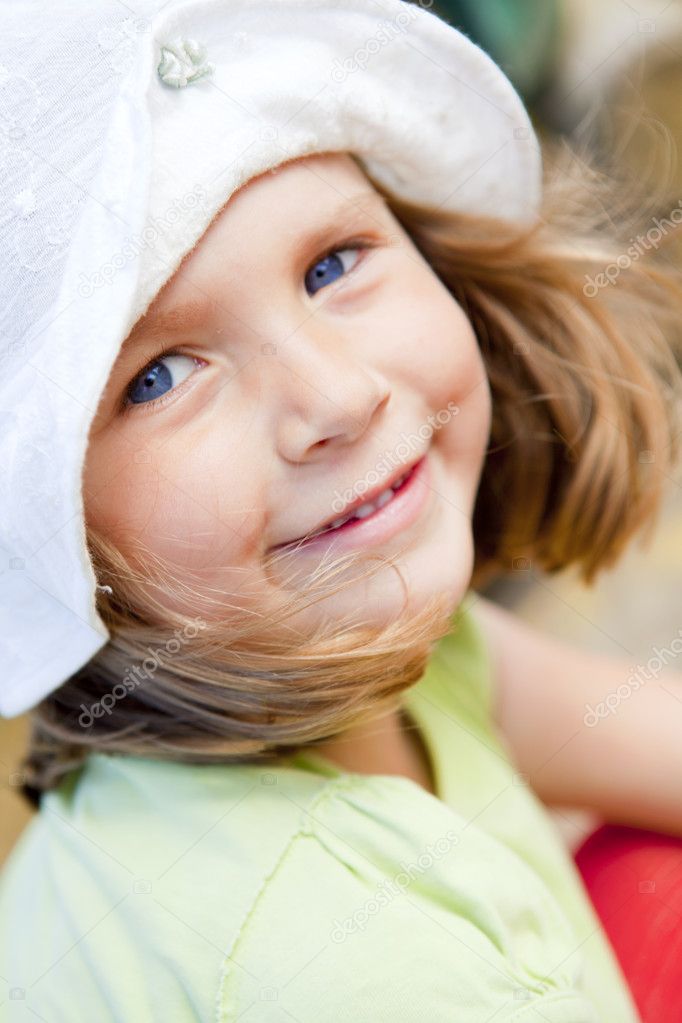Portrait of small smiling girl