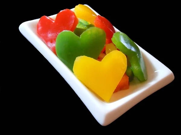 Three color bell pepper's hearts — Stock Photo, Image