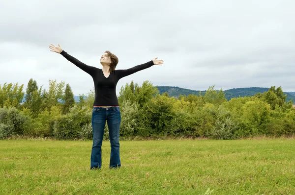 Happy woman enjoying freedom — Stock Photo, Image