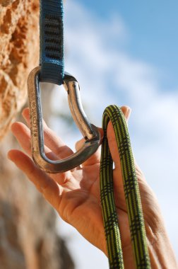 A climbers rope and quick-draws clipart