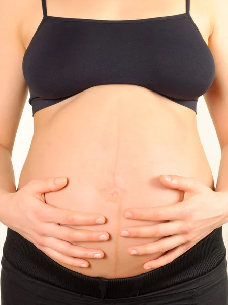 Gravid kvinna isolerad på vit — Stockfoto