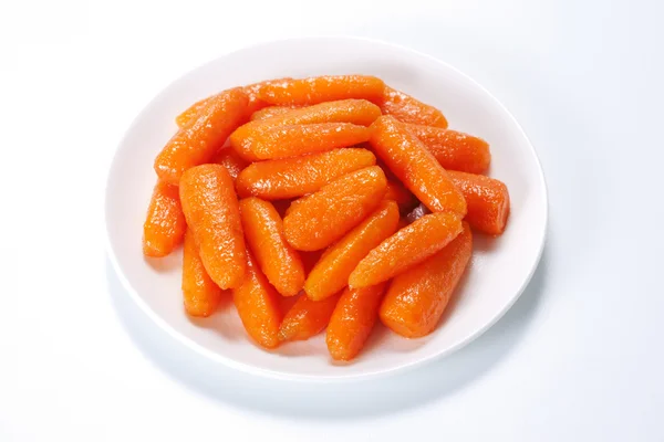 Детская морковка с медом в глазури — стоковое фото