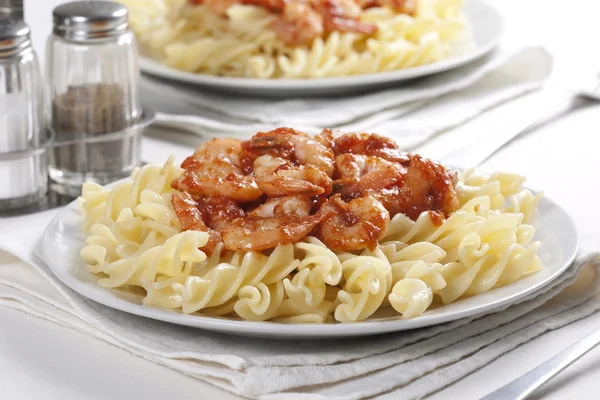 Pasta with tomato and prawns — Stock Photo, Image