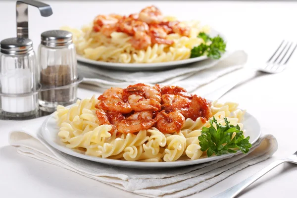 Pasta with tomato and shrimps — Stock Photo, Image
