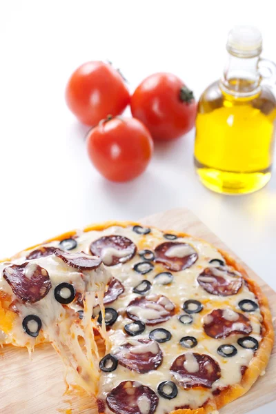 Pizza with melted cheese — Stock Photo, Image