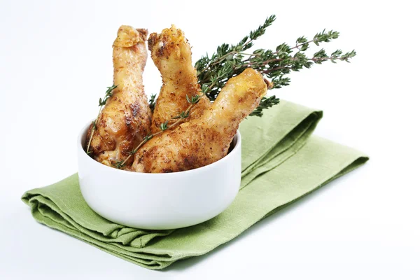 Roasted chicken legs with thyme — Stock Photo, Image