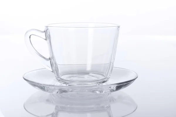 Átlátszó üveg csésze és csészealj — Stock Fotó