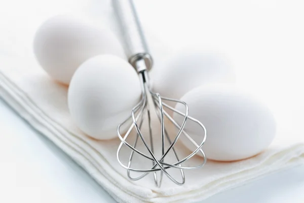 stock image Whisk and fresh eggs