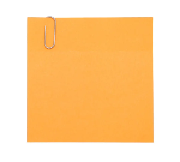 Nota de papel laranja com clipe de papel — Fotografia de Stock