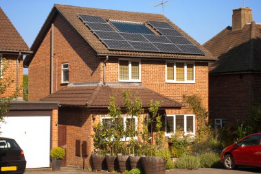 Solar panels on house clipart