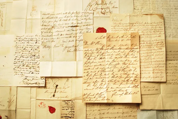 从 1800 年示例的手写字母背景 — 图库照片