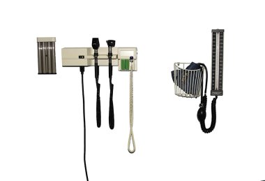 Medical diagnostic instruments mounted on the wall. clipart