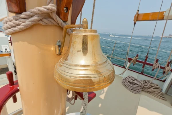 Brass bell on the private sail yacht. — Stock Photo, Image