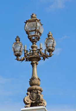 Electric lights on the streets of Paris. clipart