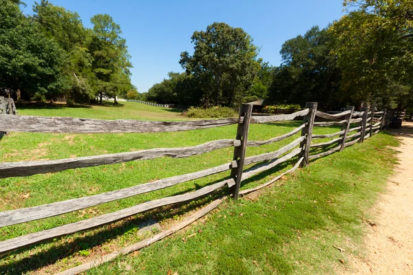 Stock image Ancient wooden fence on the farm.