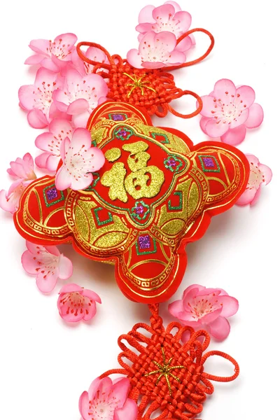 Chinese new year ornament and cherry blossom — Stock Photo, Image