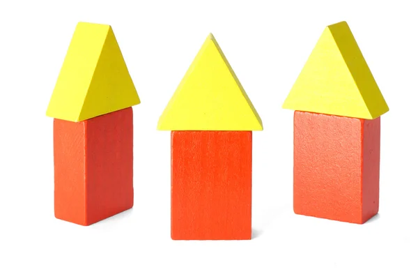 Três casas de bloco de madeira — Fotografia de Stock