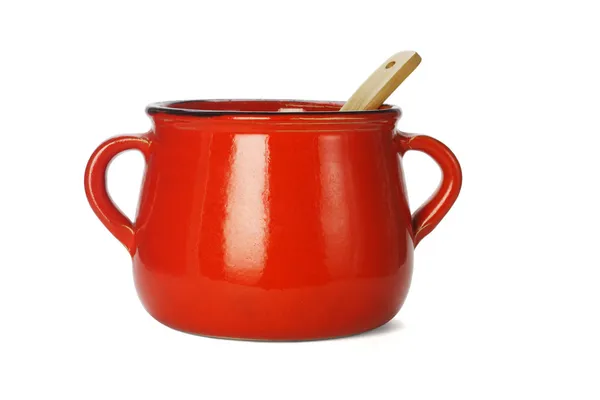 Rode klei pot met houten pollepel — Stockfoto