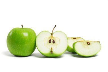 Whole green apple and cut pieces clipart