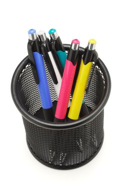 Colorful ball point pens in black container clipart