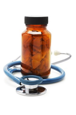 Stethoscope and bottle of vitatmins clipart