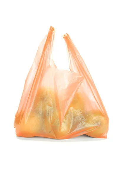 Maçãs verdes em saco de plástico — Fotografia de Stock