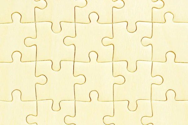 Wooden jigsaw puzzles — Stock Photo, Image