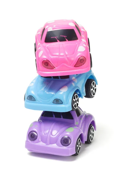 Pilha de carros de brinquedo de plástico colorido — Fotografia de Stock