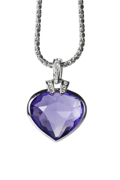 Silver pendant and blue heart shaped gemstone — Stock Photo, Image