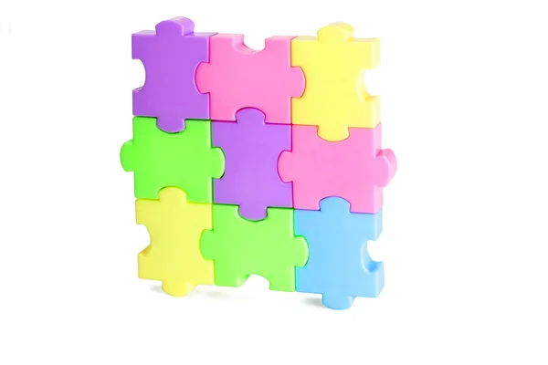 Plastic jigsaw puzzles — Stock Photo, Image
