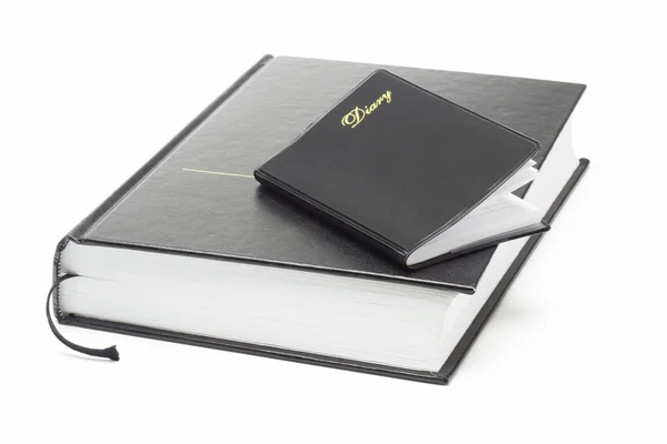Small pocket diary on Bible — Stock Photo, Image
