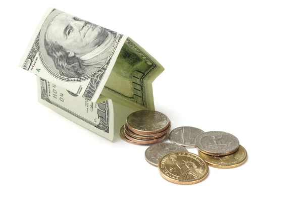 Geld huis en munten — Stockfoto
