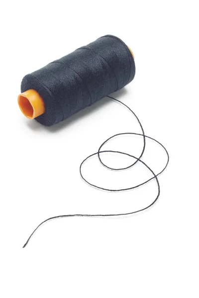 Bobina de fio de algodão preto — Fotografia de Stock