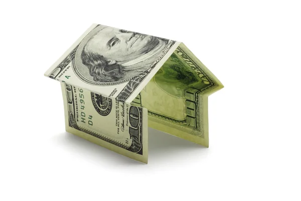 Hundred US dollar note in shape of house — Stock Photo, Image